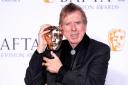 Timothy Spall in the press room after winning the Leading Actor award (Ian West/PA)