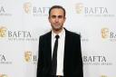 Khalid Abdalla scattered 14,000 sequins at the Bafta TV awards in an anti-war message (Jane Barlow/PA)
