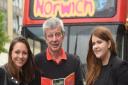 Bethany Wales, left, and Abigail Nicholson, with owner, David McMaster, after their bus tour with City Sightseeing Norwich. Picture: DENISE BRADLEY