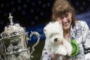 Marie Burns from County Durham with Devon a West Highland White Terrier, who won the coveted title of Best in Show at Crufts 2016. Picture: Channel 4