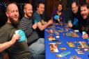 The Norwich Board Gamers group at play at the Mash Tun. Friends together play 7Wonders, a game for up to seven players. Picture: DENISE BRADLEY