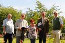 Britain in Bloom judges, Andrew Jackson, 2nd right, and Mel Henley, 2nd left, at the Jenny Lind Park for the Town Close in Bloom finalists in the Britain in Bloom Urban Communities competition. With them are the Town Close in Bloom members, from left, Pet