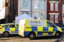 Crime scene investigators remain on scene at a house in Wellesley Road in Great Yarmouth where a mans body was discovered.Picture: James Bass