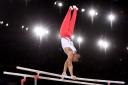 England\'s Louis Smith performs on the parallel bars in the Team Final and individual qualification at the SSE Hydro, during the 2014 Commonwealth Games in Glasgow. PICTURE: Dominic Lipinski/PA Wire.