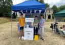 Vattenfall\'s Will Sealey (left) with summer interns Thomas White (right) and Joe Bates at an event in the Bishop\'s Garden, Norwich