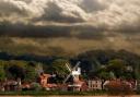 Norfolk at its most alluring and enduring …Cley Mill keeps coastal watch under attractively moody skies.