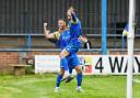 Ross Barrows celebrates the King's Lynn Town equaliser with Jonny Margetts