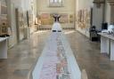 A 164ft long watercolour painting has gone on display in Wymondham