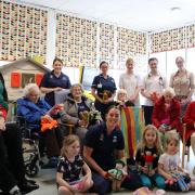 Many knitters from the care home joined Avice in the visit to donate their handmade goods