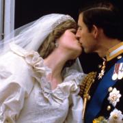 The Prince and Princess of Wales kissing on the balcony of Buckingham Palace, London, after their wedding ceremony at St Paul's Cathedral on July 29 1981.