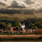 Norfolk at its most alluring and enduring …Cley Mill keeps coastal watch under attractively moody skies.