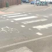 Fading road markings have alarmed Labour county councillor Matt Reilly (inset)