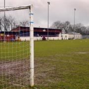 Thetford Town's play-off final place is at risk as they await the outcome of an appeal
