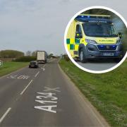 A woman has been taken to hospital after a two-car crash in west Norfolk
