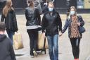 Shoppers in Norwich staying safe in face masks.
 Picture: Sonya Duncan