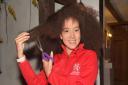 Carly Gorton, aged 10 in this photograph, pushed for The Little Princess Trust to create their first ever wig made from Afro hair.