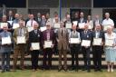 Long service award winners pictured with Royal Norfolk Show president, the Marquess of Cholmondeley (front centre)