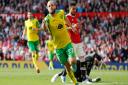 Teemu Pukki celebrates after scoring Norwich City's second goal to level matters against Manchester United at Old Trafford