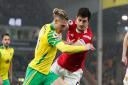 Przemyslaw Placheta tries to get the better of Harry Maguire in Norwich City's last Premier League tussle with Manchester United