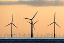 File photo dated 02/07/15 of a sea of wind turbines. Sudden and unexpected changes in policy have 