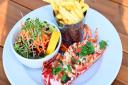 Rocky Bottoms Crab and Lobster restaurant, Cromer Road, West Runton. Lobster with garlic butter, chips and salad. Pictures: Brittany Woodman