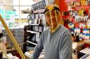 Tony Gooch still sports a face shield in his shop at Hunstanton