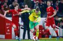 Norwich City exited the FA Cup after a 2-1 defeat to Liverpool at Anfield.