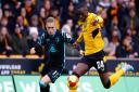 Przemyslaw Placheta closes down Wolves defender Toti Gomes during City's FA Cup win at Molineux