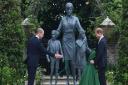 The Duke of Cambridge (left) and Duke of Sussex unveiling a statue they commissioned of their mother Diana, Princess of Wales, in the Sunken Garden at Kensington Palace, London, on what would have been her 60th birthday.