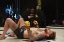 My Fighter of the Year James Webb hits the floor after stopping Jason Radcliffe at Cage Warriors 99 in Colchester. Picture: BRETT KING