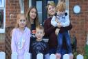 Claire Gill with her children (from left): Ebony, 10, Lisa, Henry, 7, and Lottie, 3, all of whom tested positive for coronavirus.