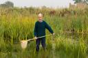 Richard Waddingham working on a pond  Picture: ARCHANT