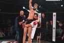 Norfolk's Scott Butters hoists Kim Thinghaugen in the air after he had inflicted the first defeat of Butters' pro career on the lightweight prospect at Contenders 24. Picture: BRETT KING