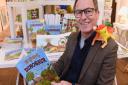 Author Douglas Vallgren with his third children's book about Rupert the Dinosaur, launched at the Giggly Goat in Lower Goat Lane. Picture: DENISE BRADLEY