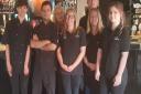 The team at The White Hart pub in Swaffham. From left trainee chef Gordon, chef Leo, catering manager, Karen, bartender Amy, Kurt Oliver, Laura Oliver and bartender Louise. Picture: The White Hart.