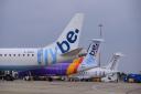 Flybe planes at Norwich International Airport - having the option to fly by plane across this country is a vital alternative, says David Clayton