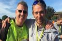 Dominic Blake with Jonathan Thetford at the finish of the Round Norfolk Relay. Picture: Reepham Runners