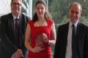 Julie Henson was named Sportswoman of the Year at the Norfolk Sports Academy's 2019 awards by the UEA's chief resource officer Ian Callaghan, right, and Steffan Griffiths, the headmaster at Norwich School Picture: Norfolk Sports Academy