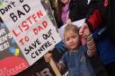Martha Smith-Cordiner, two, daughter of councillor Mike Smith-Clare, Labour lead for children and young people, protesting against the closure of Children's Centres. Picture: DENISE BRADLEY
