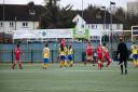 Grace Parker jumps above the Haringey defence to head home Acle's goal Picture: Natasha Thompson