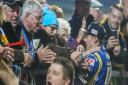 Robert Lambert talks to the travelling King's Lynn Stars fans at Poole Picture: Taylor Lanning