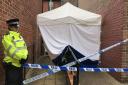 Scene where the body of a man was found in an alleyway leading to Murrell's Court. Picture: Archant