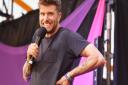 Joel Dommett on the Comedy stage at Latitude.Pic. Nick Butcher