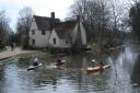 Kayak paddlers take the place of Constable's hay cart in the ford by Willy Lott's house. Picture: Don Black