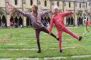 Sisters, Amber, nine, and Briony, seven, try out the ribbons at the Norwich Cathedral Fun Day. Picture: DENISE BRADLEY