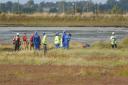 Fire Search and Rescue, the coastguard and the police at Breydon Water's edge to recover two bodies, believed to be a man and a woman, from the mud bank. Picture: DENISE BRADLEY