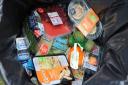 Food thrown away in a dustbin. Consumers are throwing away �13 billion of edible food from homes a year, figures suggest. Picture: Nick Ansell/PA Wire