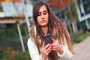 Teenage girl on a mobile phone. Photo: Pexels/JeShoots