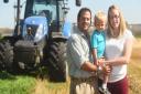 Neil Clark and his wife Alyson, here pictured with their two year-old son Alfie, will be driving a tractor from Land's End to John O'Groats to raise money for EACH. Picture: Ian Burt