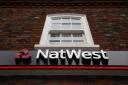 A NatWest branch, as the major banking group warned more than one million of its customers could be charged negative interest rates if market conditions change. In a letter setting out changes in terms and conditions to 1.3 million customers across NatWes